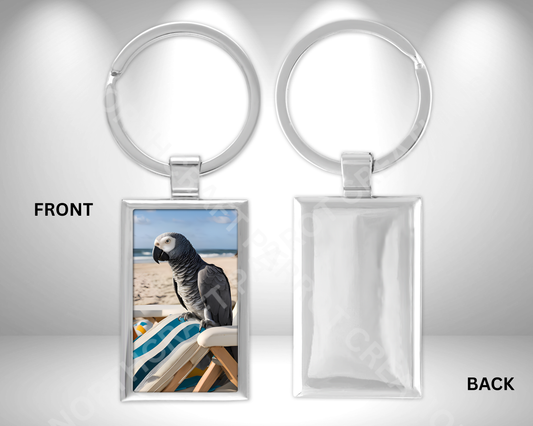 African Grey on Beach Chair Rectangle Metal Keychain