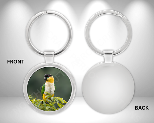 Caique Perched on Greenery Circle Metal Keychain
