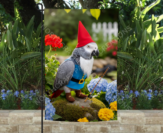 African Grey Dressed as Garden Gnome Among Flowers on a Rock Garden Flag