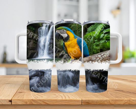 Blue and Gold Macaw on Branch with Waterfall 40oz Stainless Steel Parrot Tumbler