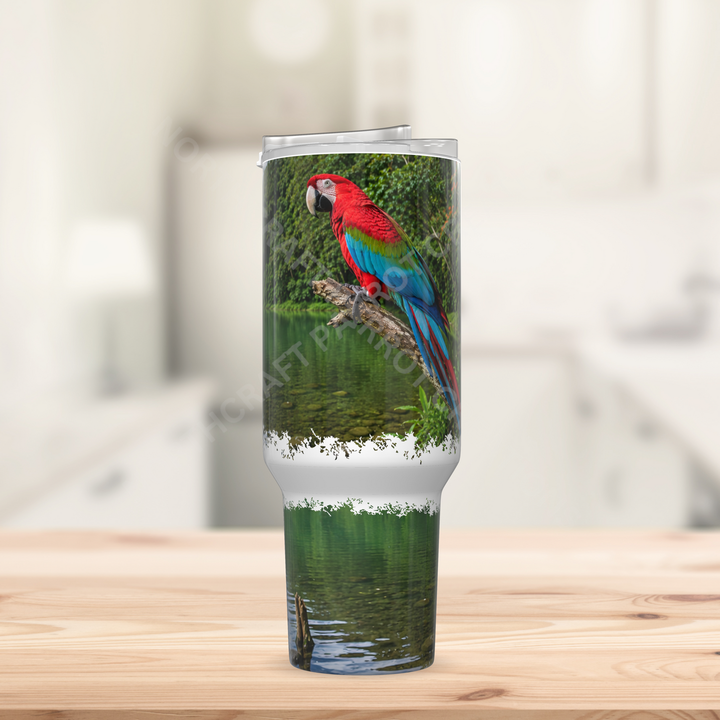 Green-winged (Greenwing) Macaw on branch with Lake 40oz Stainless Steel Parrot Tumbler