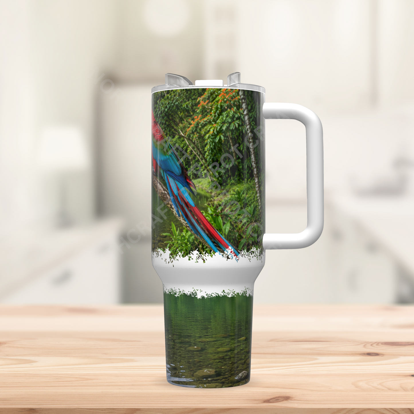 Green-winged (Greenwing) Macaw on branch with Lake 40oz Stainless Steel Parrot Tumbler