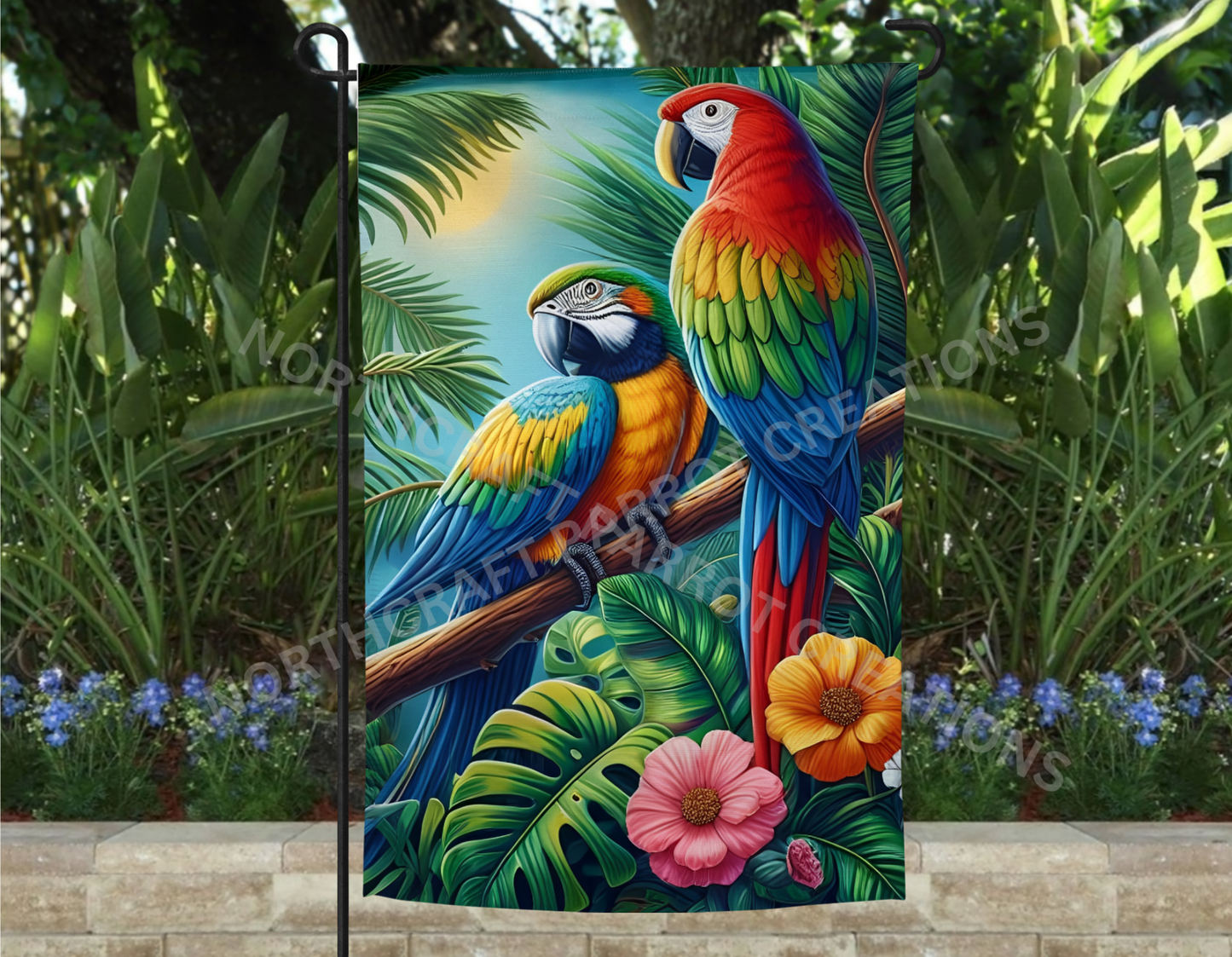 Macaws in a garden among flowers Garden Flag